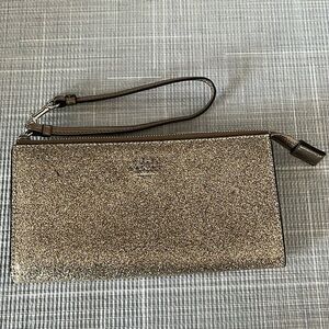 COACH gold wristlet